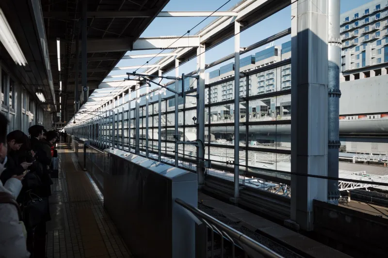 Waiting as Witness: How Japanese Cinema Transforms Liminal Spaces into the Soul of a Story